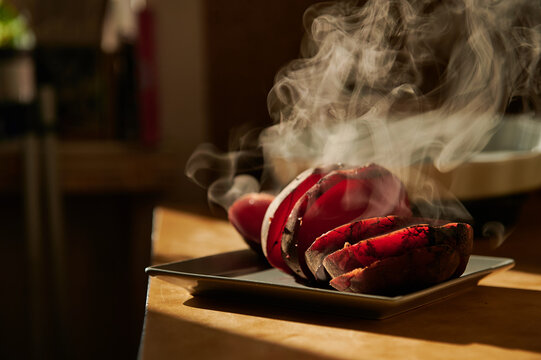 whole cooked red fodder beets presented on a plate