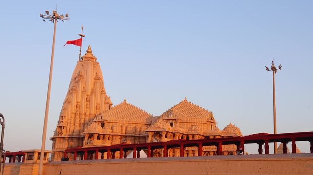 scenic view of somnath temple complex during golden hour shot is taken at Somnath, Gujarat india.