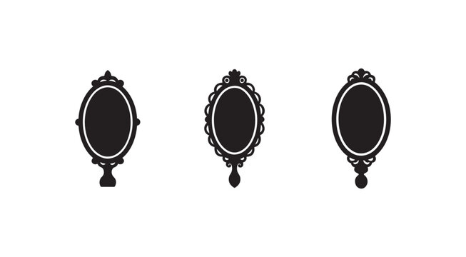 Set of three antique ornate oval mirror frames with intricate designs and white outlines on a white background