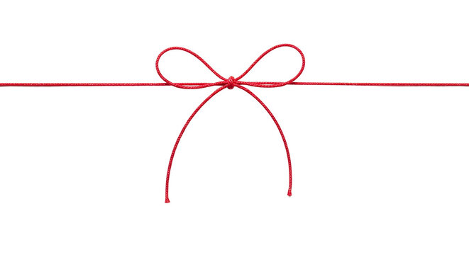 Red ribbon tied in a bow on a white background, isolated on transparent background with natural lighting and a simple composition