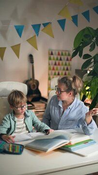 The mother is trying to explain his homework her son, but he does not understand