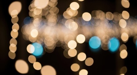 Obraz premium Blurry image of colorful string lights on a dark background with bokeh effect and copy space for des