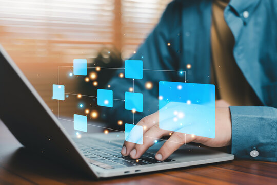 Digital data flow and business process concept with person typing on laptop and virtual interface nodes, representing workflow automation, system integration, cloud computing, and modern technology
