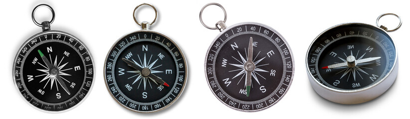 Collection of vintage and modern compasses, displaying magnetic needles pointing north. © FoodPNG