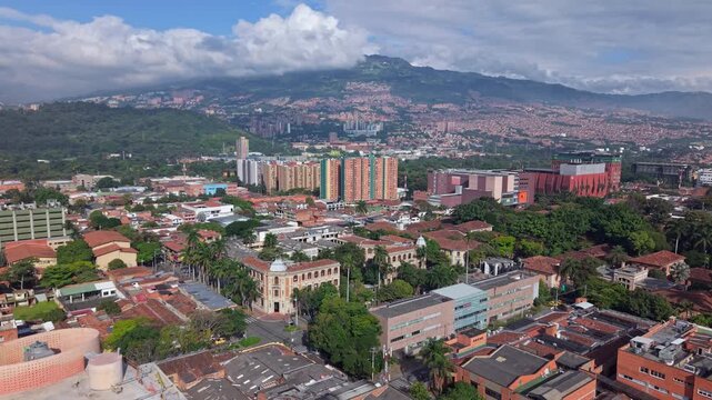 Aerial view of Medell&iacute;n city with mountains, vibrant urban landscape