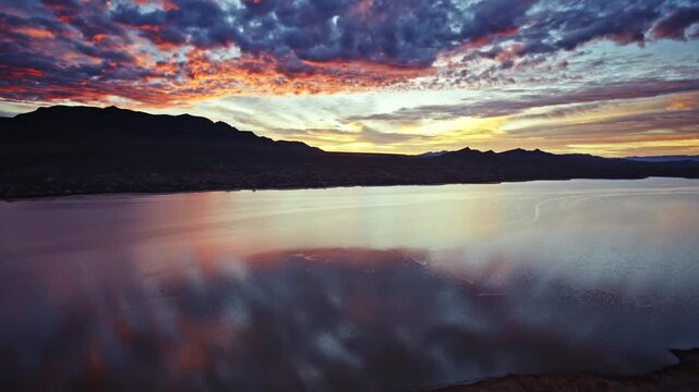 Cinematic aerial sunrise revealing the landscape around Caballo Lake State Park in New Mexico.