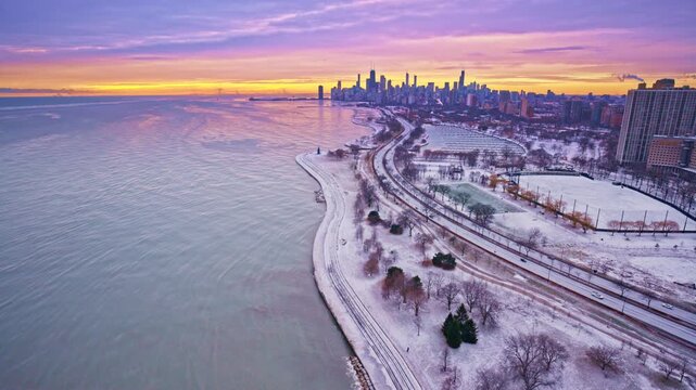 Cinematic aerial drone view of downtown Chicago&rsquo;s Loop at winter dawn.