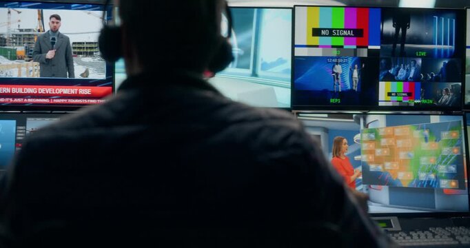 TV Station Production Control Room Tracks Operators Monitoring Multiview Screens, Switching Live Politics, Economy, Entertainment Feeds Anchors and Presenters Talk on Live Broadcast