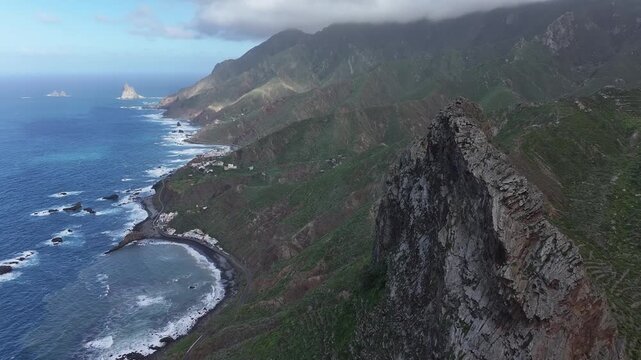 Anaga Rural Park in the northern part of Tenerife. In the foreground, the Roque de las Animas cliff. Canary Islands.