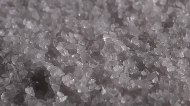 Coarse salt. Cooking. Salt. Coarse grind. Slow motion video. High quality 4k footage