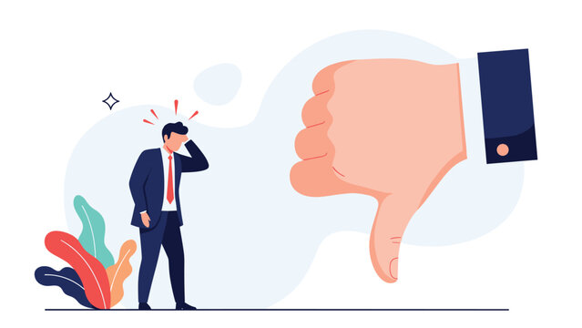 Disappointed businessman looking down in sadness next to a giant blue thumbs down symbol representing negative feedback.