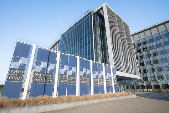  Brussels  Belgium 19 March 2026.Exterior view of the NATO Headquarters in Brussels, Belgium. Modern glass architecture housing the North Atlantic Treaty Organization, an international military allian