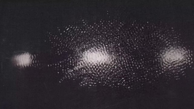 Abstract dark background with shimmering water ripples and light reflections