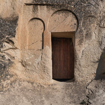 St. Catherine's Chapel Azize Catherine Sapeli ancient rock-cut entrance with wooden door, Goreme, Cappadocia, Turkey