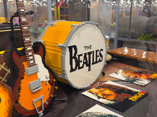 Fototapeta premium Lego brick beatles drum and guitar exhibit display