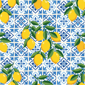 Seamless pattern with lemons and blue mediterranean ceramic tiles azulejo