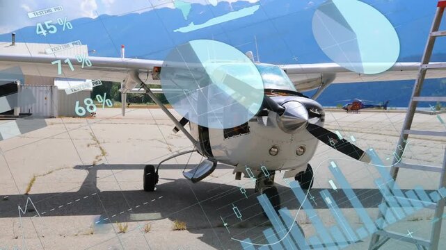 Animation of infographic interface over parked glider airplane in airport