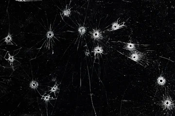 Bullet holes on black glass, overlay design background © kichigin19