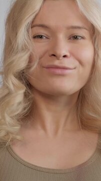 Happy Woman Shows New Hairstyle. Woman Displaying Joyful Confidence Following Her Hair Transformation. Woman Radiates Happiness And Renewed Selfassurance After Styling Her Hair Differently