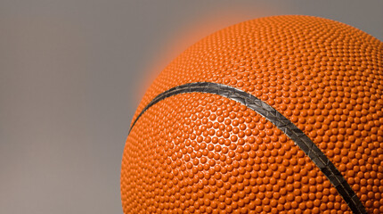 Fototapeta premium Close up of an Orange Basketball Showing Detailed Texture and Black Stripe