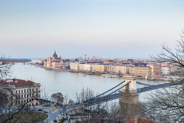 Obraz premium panorama view at the parliament with Danube river in Budapest
