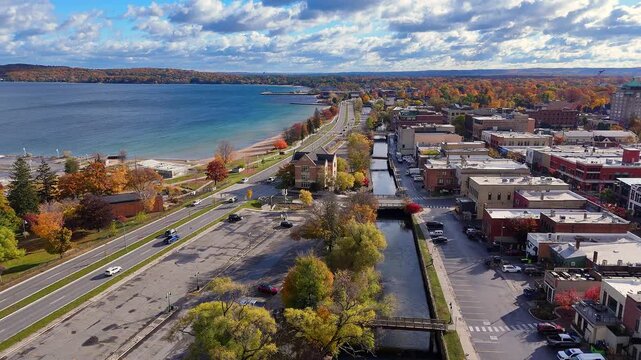 Traverse City Michigan coastline autumn colors along Grand Traverse Bay in aerial view, USA