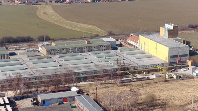 Drone view of industrial zone with data centers and solar panels.
Modern city infrastructure supporting digital technology.
