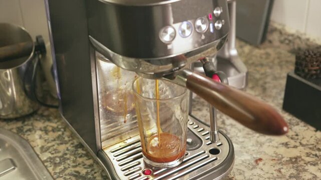Espresso machine brewing a perfect crema coffee shot
