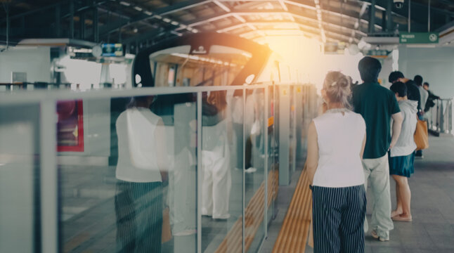 Shallow focus of a modern yellow monorail train in Bangkok, Thailand. Fast and convenient urban mass transit providing high quality of life and seamless commuting in a smart city environment.