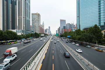 Naklejka premium Beijing Urban Highway with Modern Skyscrapers and Traffic