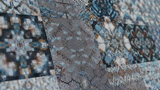 Vibrant patchwork textile with intricate patterns.
