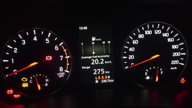 Car Dashboard Instrument Cluster Close-Up at Night, Illuminated Speedometer, Tachometer and Fuel Economy Display, Modern Vehicle Driving Interface, Automotive Technology 4K Footage