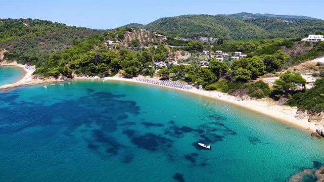 Aerial view of the popular Banana Beach at Skiathos island, Sporades, Greece, with fine sand and pristine sea