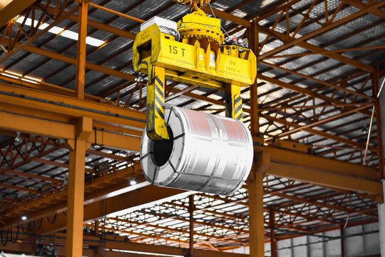 Overhead Gantry Crane Loading Steel Coil onto Flatbed Trailer