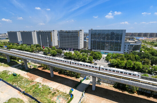 Wuhan Metro Elevated Train Line with Modern Residential Buildings