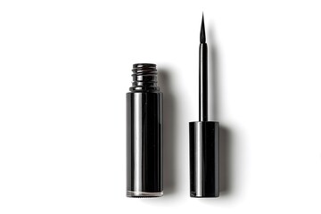 Obraz premium Black liquid eyeliner and applicator brush on white background