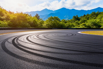 Fototapeta premium Race Track with Tire Marks and Natural Landscape