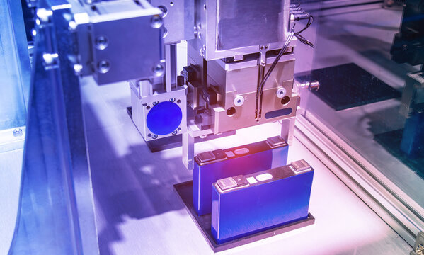 Advanced Industrial Robot Arms Assemble EV Battery Pack on Automated Production Line in Modern Electric lithium battery Smart Factory.