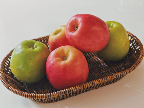 Fresh, organic apples in a basket. Healthy eating, healthy food. Beautiful apples.