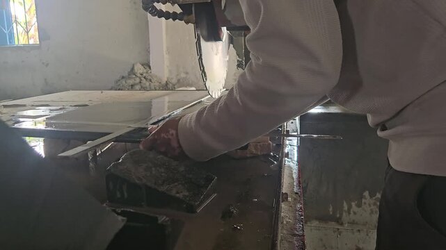 Industrial CNC machine, Stone Cutting Machine in Workshop, Worker Processing Marble or Granite Slab, Construction Material Fabrication, Heavy Machinery Operation, Manufacturing Industry 4K Footage