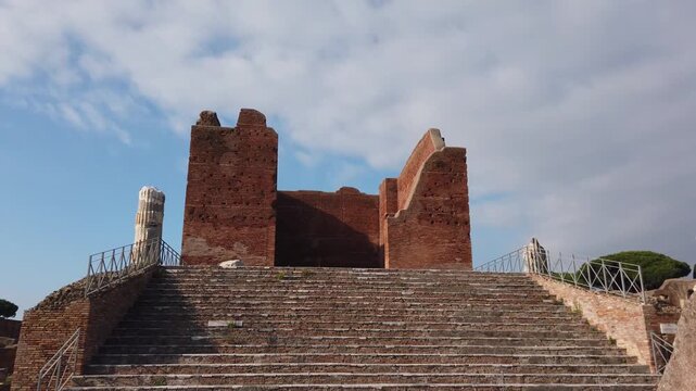 Ancient ruins of ostia antica theatre, historic site with crumbling brick walls and weathered stone in motion