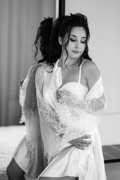 preparations for the bride with the dressing of the wedding dress