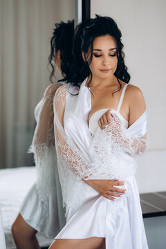 preparations for the bride with the dressing of the wedding dress