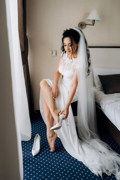 preparations for the bride with the dressing of the wedding dress