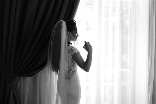 preparations for the bride with the dressing of the wedding dress