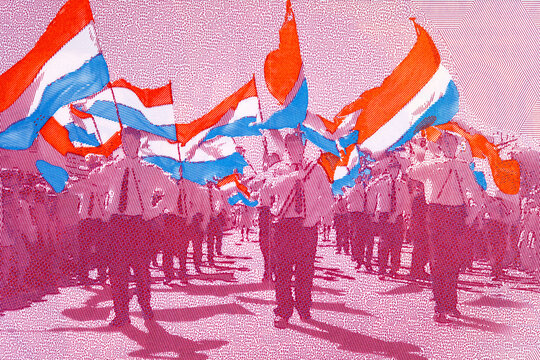 2000 Guaranies Paraguay featuring a parade of students carrying national flags. Colorful polymer currency note from South America. Money of Paraguay.