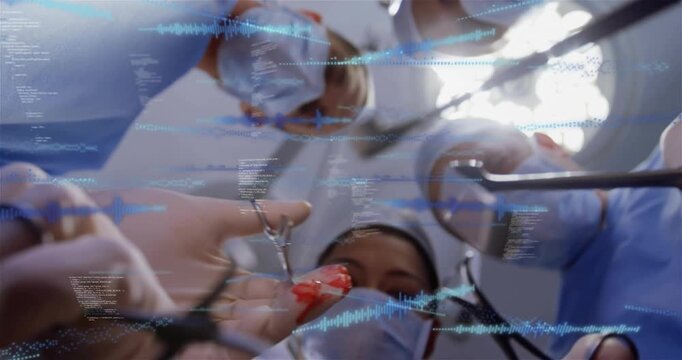 Vertical video: Surgical team leaning in OR forceps lifting tissue starting AR data guiding removal