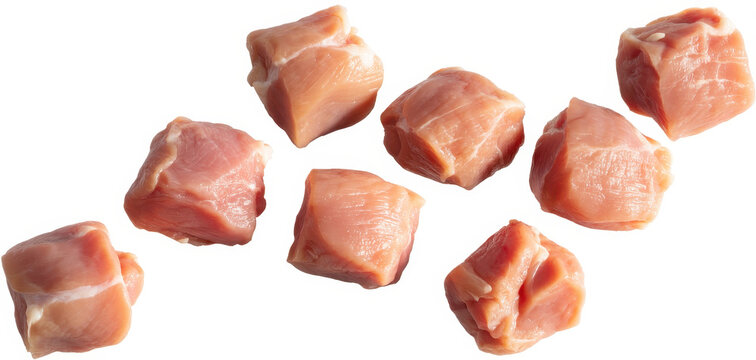 Fresh chunks of raw chicken meat on white background