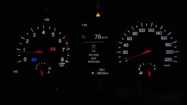 Car Dashboard Instrument Cluster Close-Up at Night, Illuminated Speedometer, Tachometer and Fuel Economy Display, Modern Vehicle Driving Interface, Automotive Technology 4K Footage