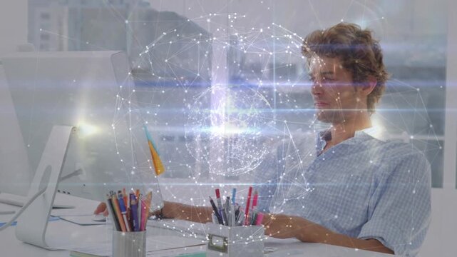 Typing man in shirt at desk by window tapping pens watching hologram above screen or keys, copy spac
